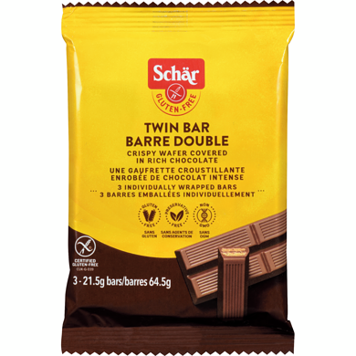 64.5 gram brown and yellow package of Schar Twin Bar
