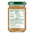 Back side of a jar of peanut butter with a nutrition label.