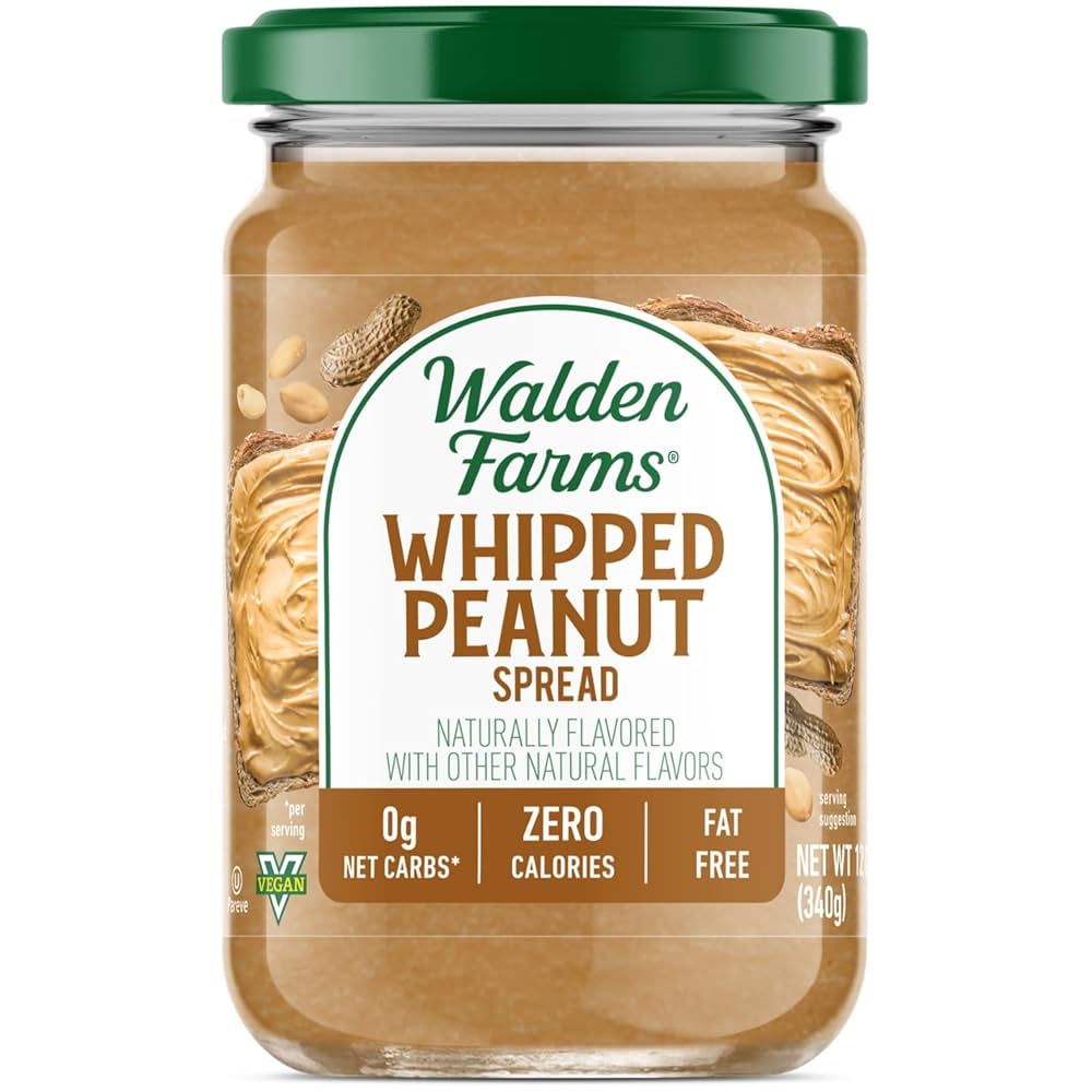 Jar of Walden Farms Whipped Peanut Spread with a green lid on a white background.