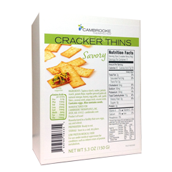 150 gram white and green box of Cambrooke Savory Cracker Thins