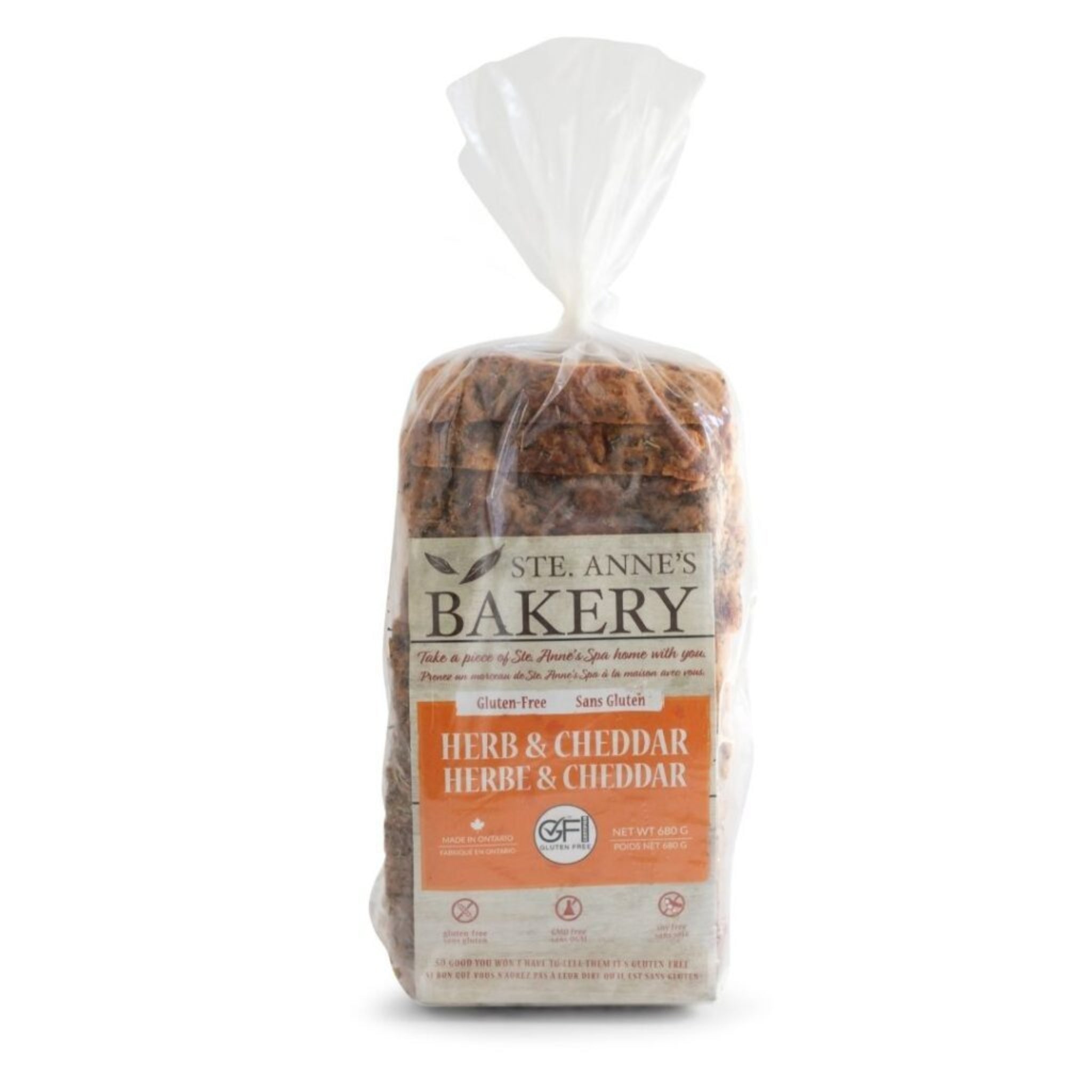 Ste Anne's herb and cheddar bread in clear plastic bread sleeve. 