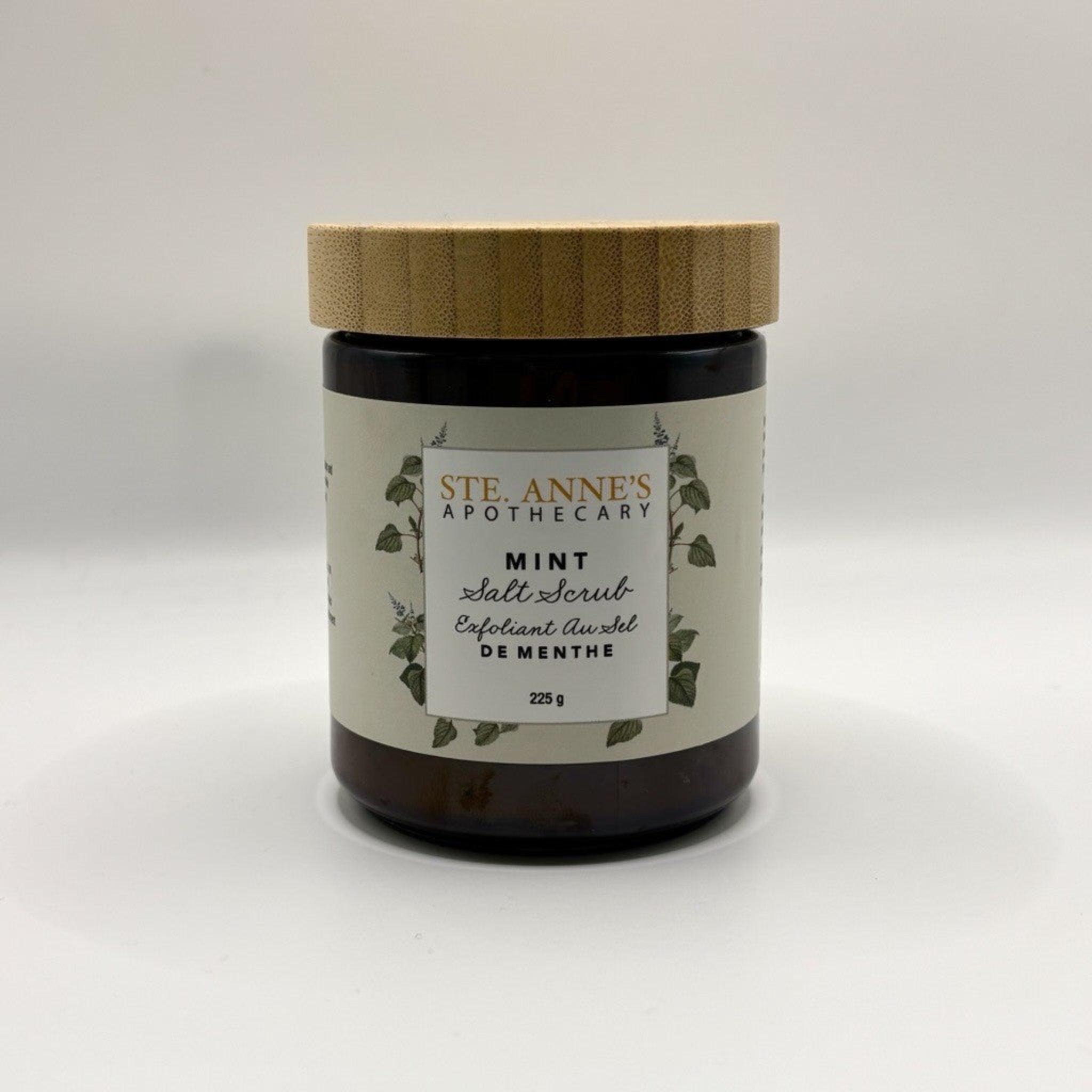 Ste Anne's Mint salt scrub in glass jar with wood lip. 225 grams. 