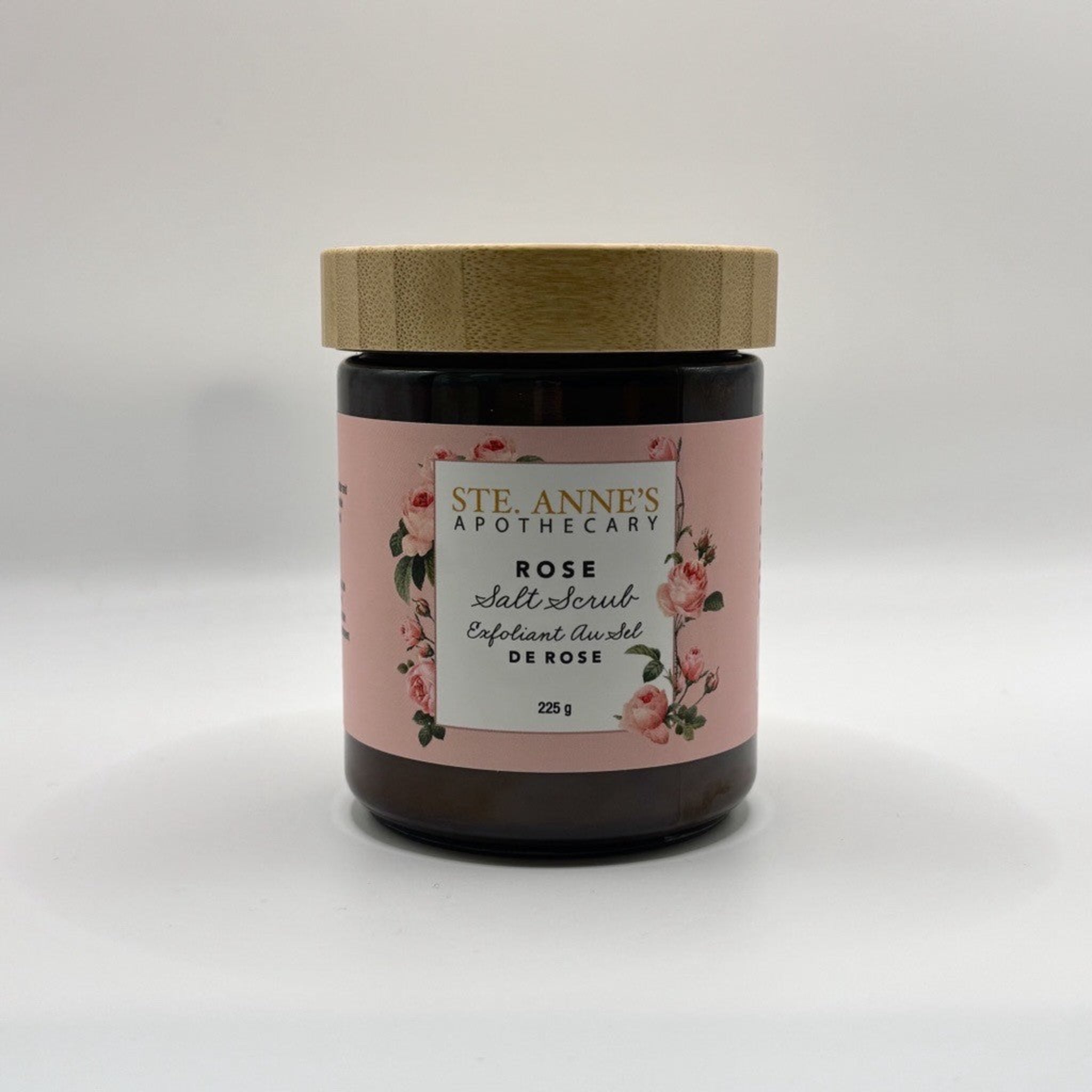 Ste Anne's Spa rose salt scrub in glass jar with wood lip. 225 grams. 