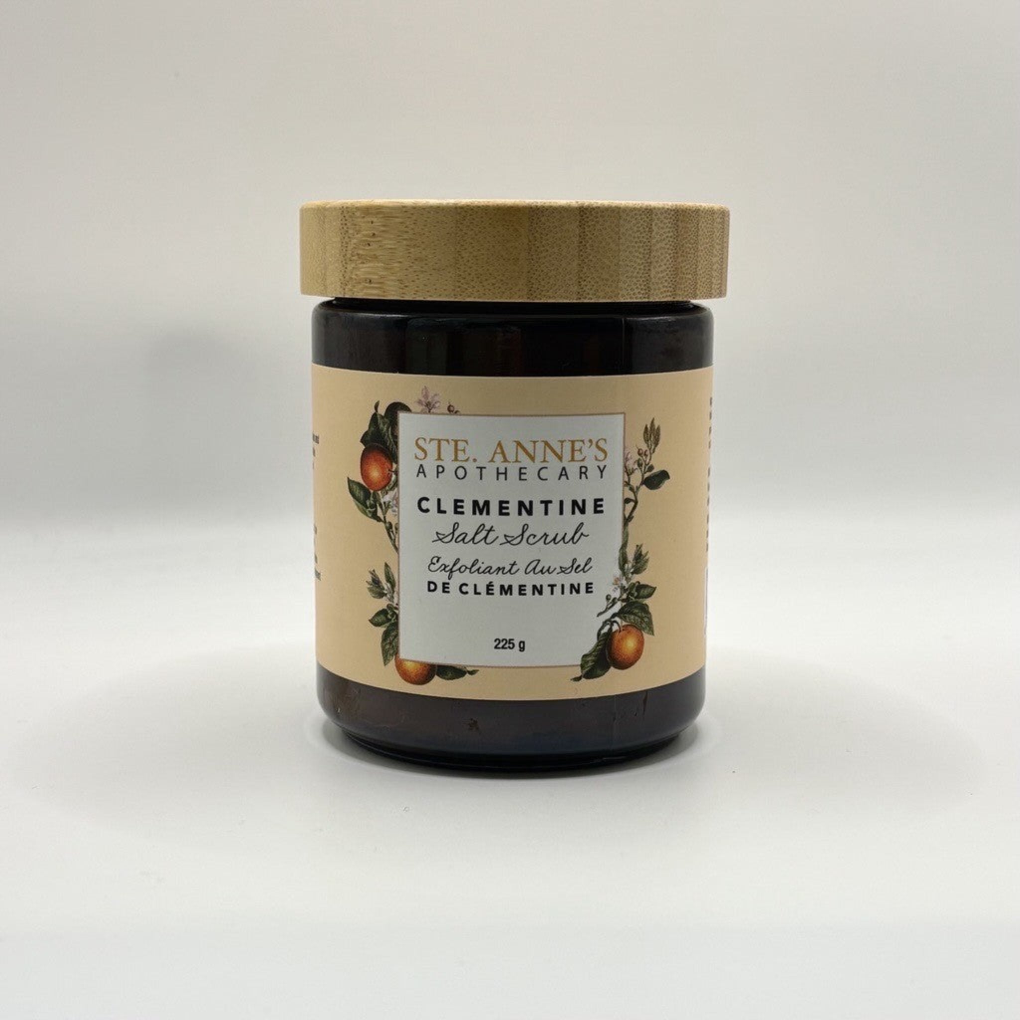 Ste Anne's Clementinw Salt Scrub in glass jar and wood lip. 225 grams. 