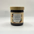 Ste Anne's Clementinw Salt Scrub in glass jar and wood lip. 225 grams. 